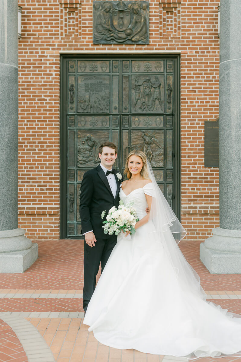 bride and groom posing for beaumont wedding photographer