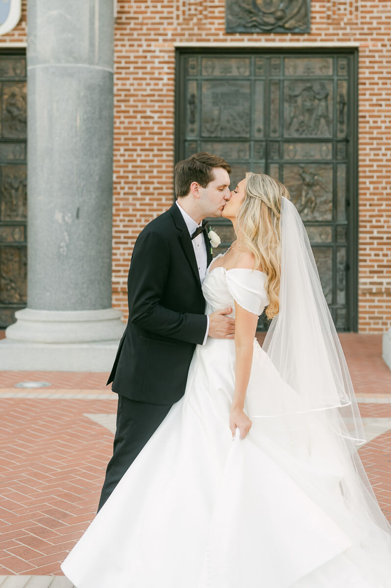 bride and groom posing for beaumont wedding photographer