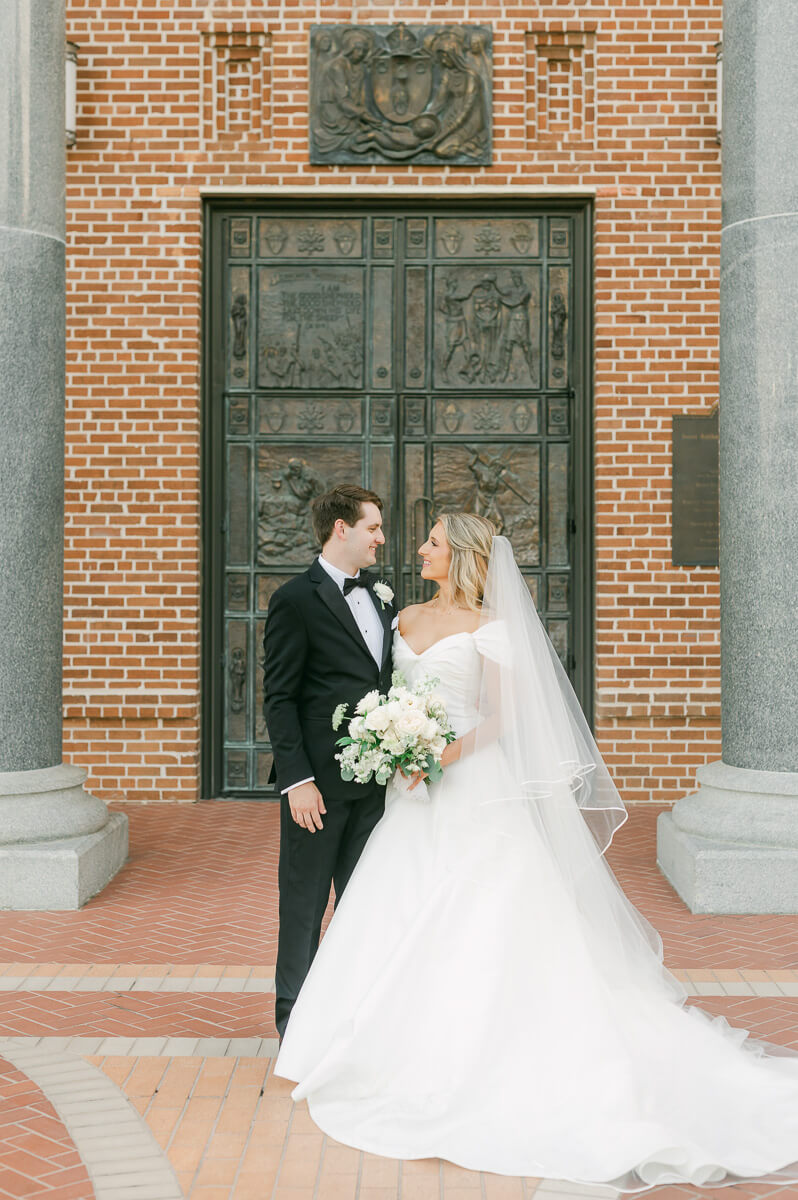 bride and groom posing for beaumont wedding photographer