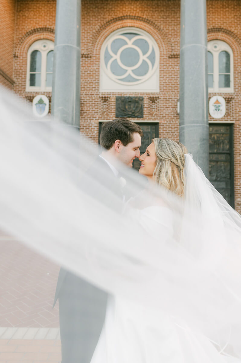 bride and groom posing for beaumont wedding photographer