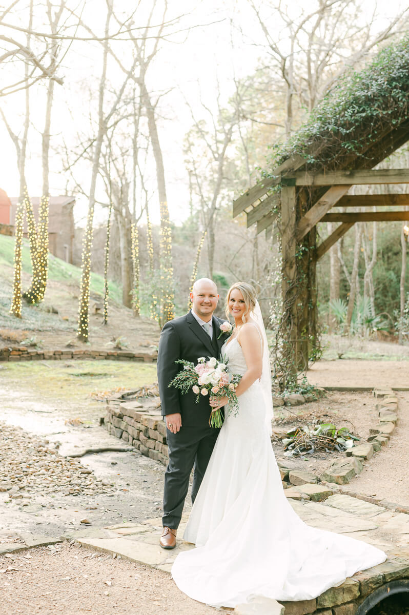 bride and groom posing for houston wedding photographer