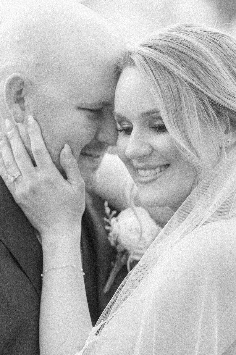 bride and groom posing for houston wedding photographer