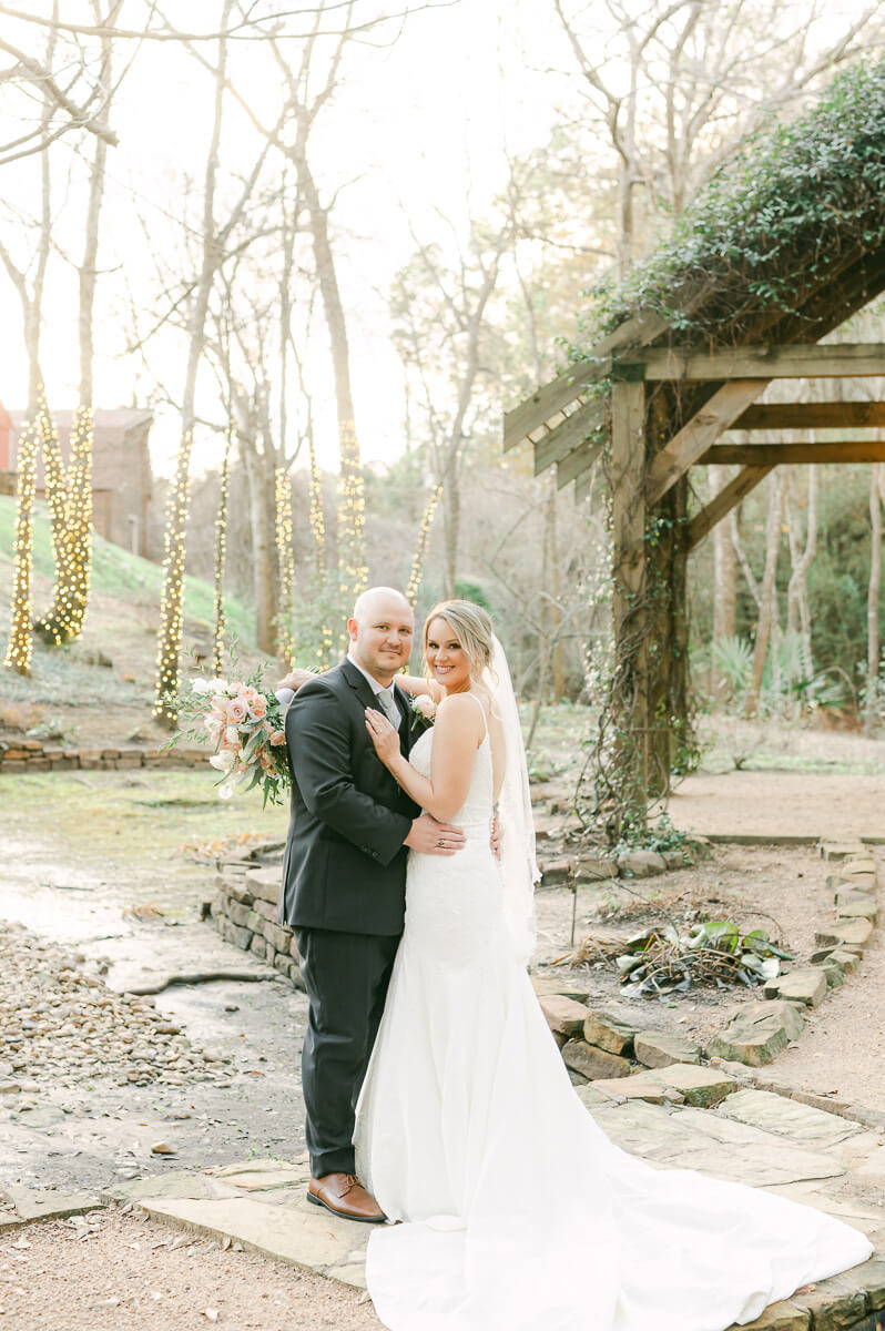 bride and groom posing for houston wedding photographer