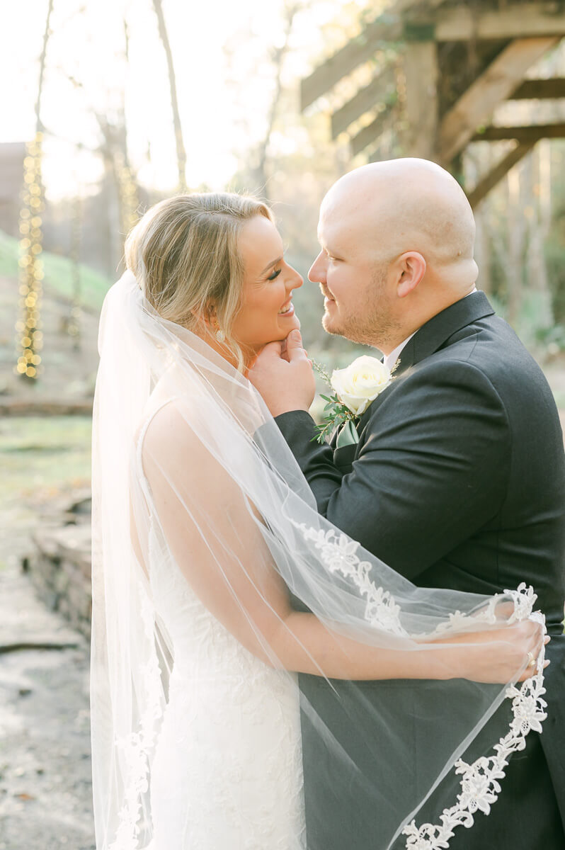 bride and groom posing for houston wedding photographer