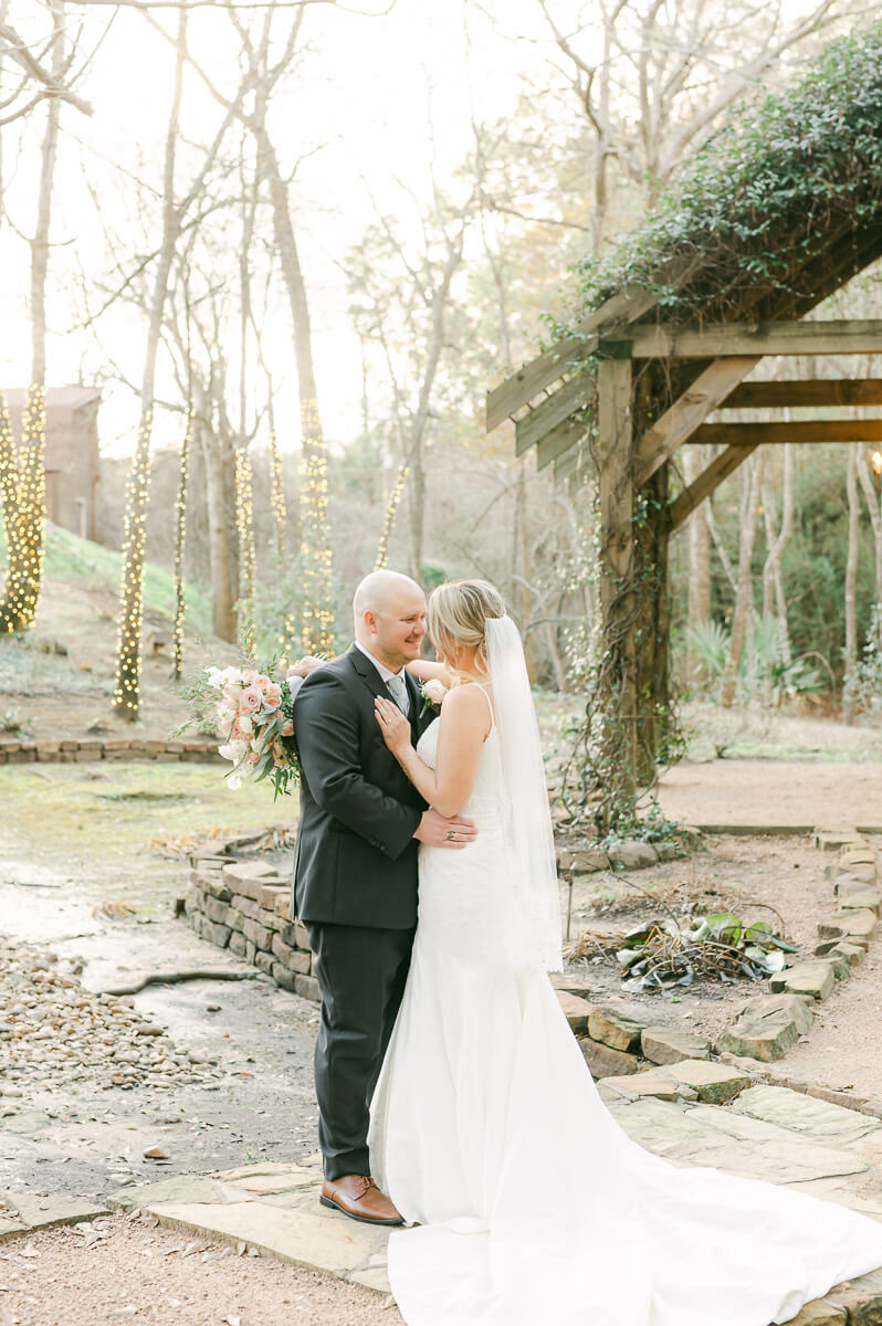 bride and groom posing for houston wedding photographer