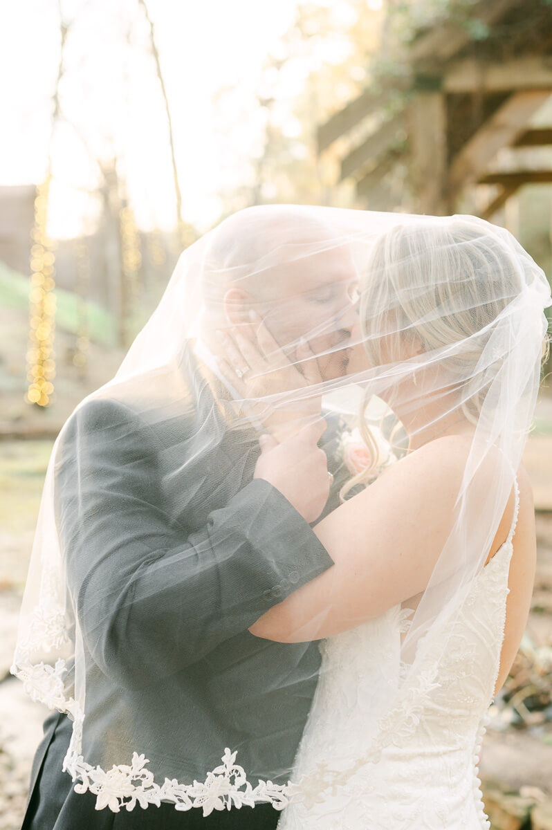 bride and groom posing for houston wedding photographer