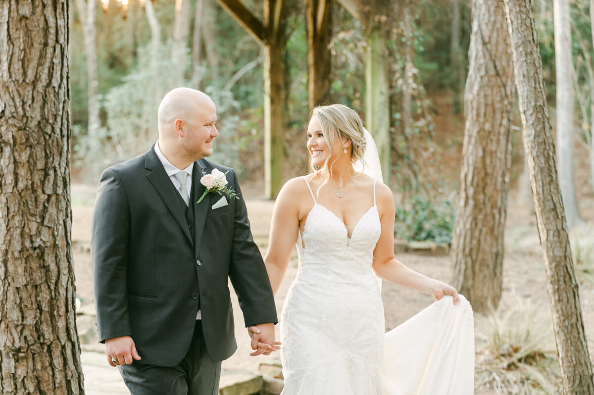 bride and groom posing for Montgomery, Tx wedding photographer