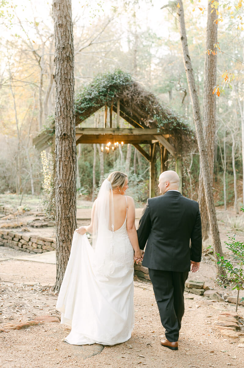 bride and groom posing for Montgomery, Tx wedding photographer