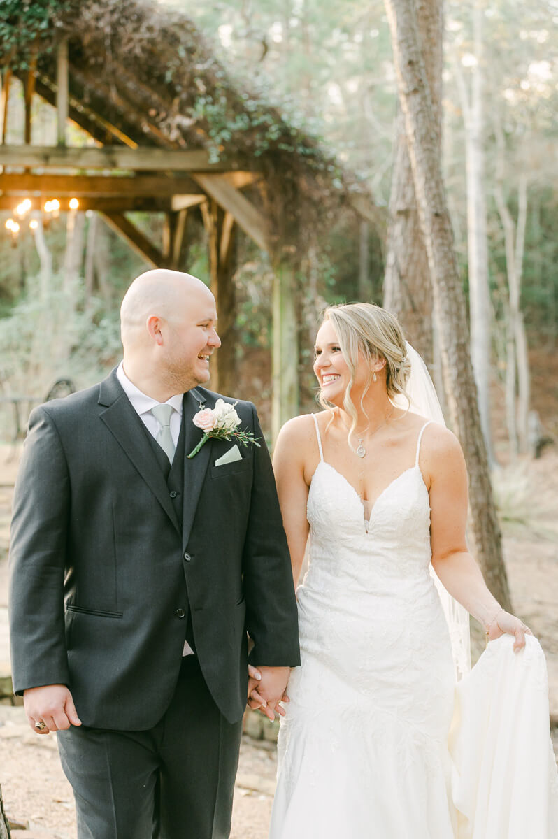 bride and groom posing for Montgomery, Tx wedding photographer