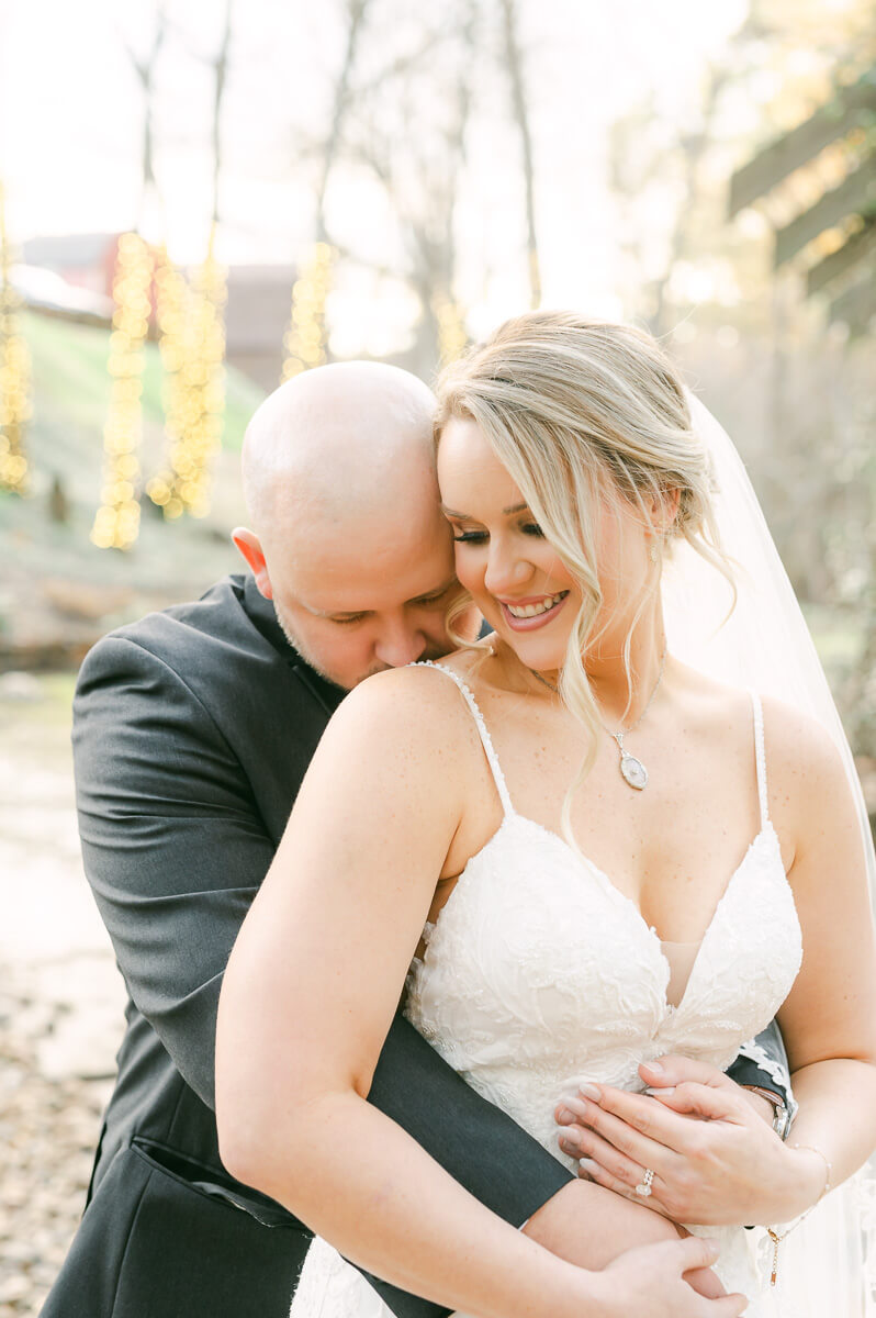 bride and groom posing for Montgomery, Tx wedding photographer