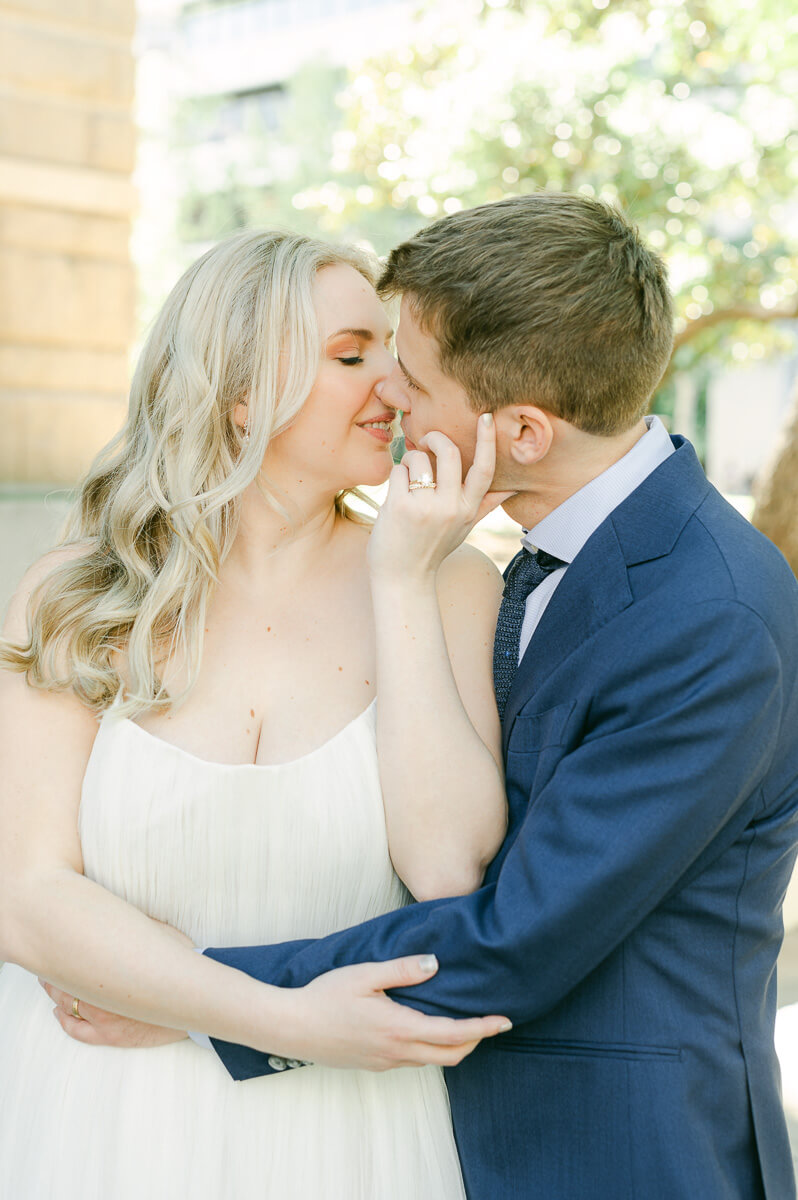 bride and groom posing for Houston wedding photographer