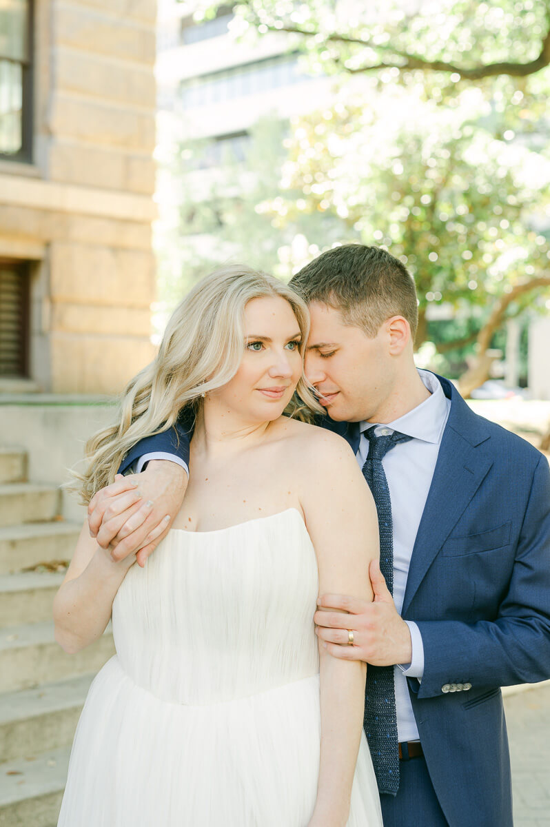 bride and groom posing for Houston wedding photographer