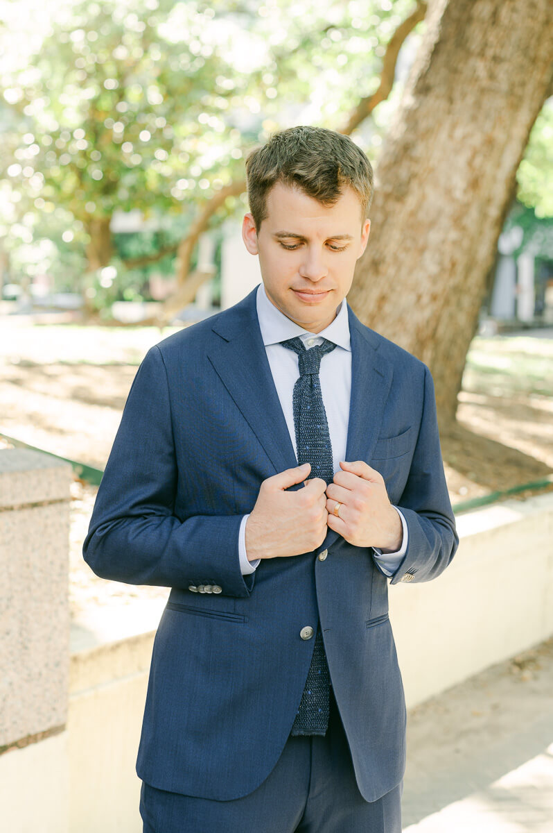groom posing for Houston wedding photographer