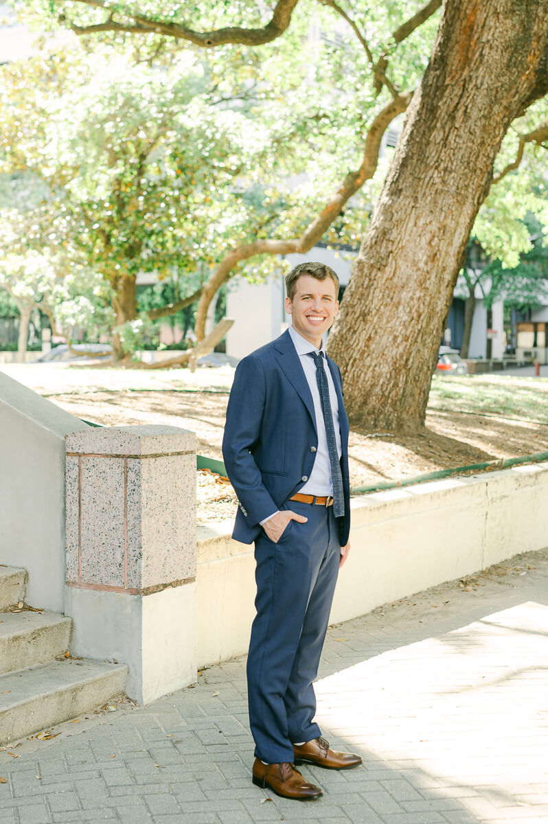 groom posing for Houston wedding photographer