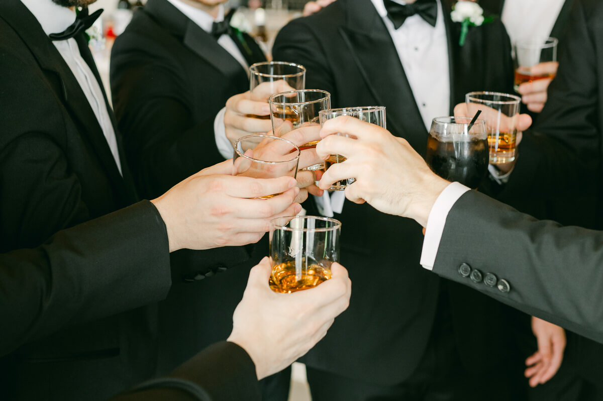 groomsmen drinking at Grand Pines Reserve in Conroe, Tx