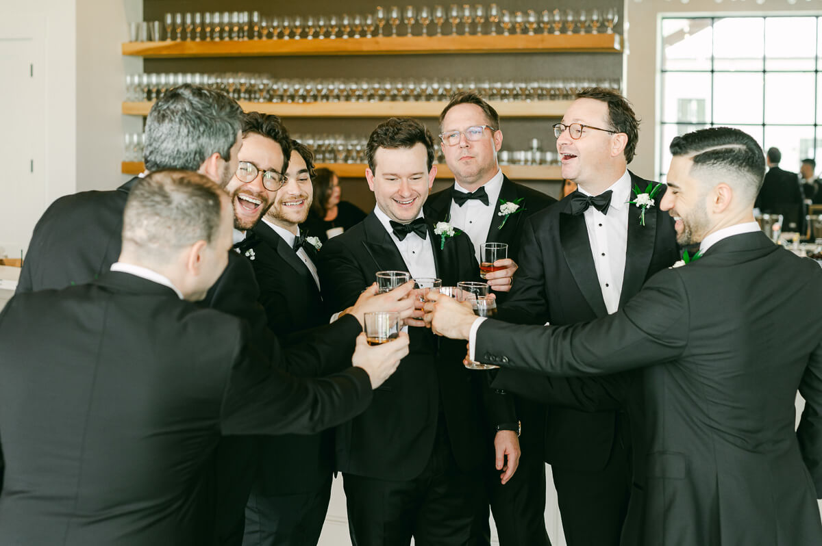 groomsmen drinking at Grand Pines Reserve in Conroe, Tx