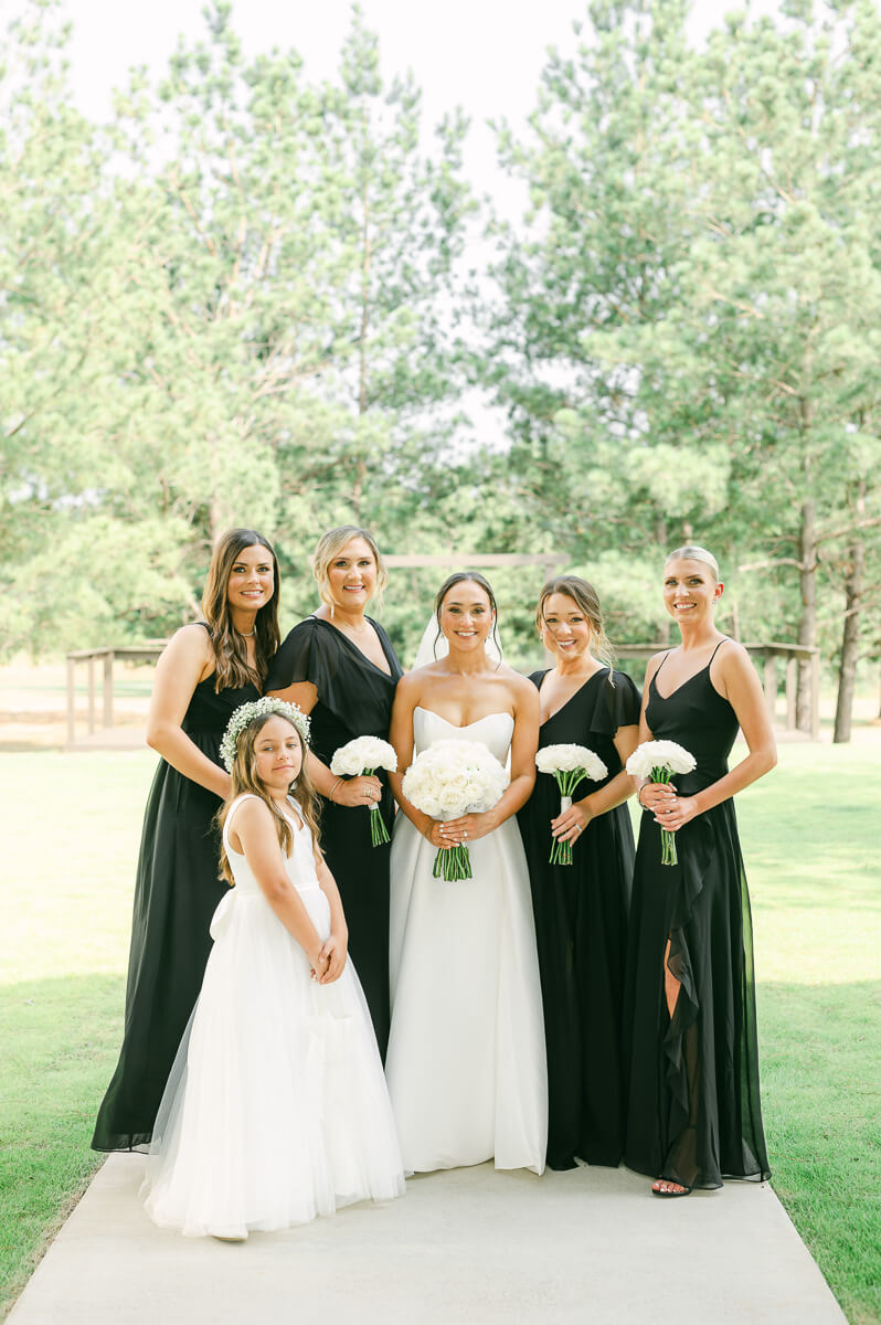 bridesmaids outside Grand Pines Reserve in Conroe, Tx