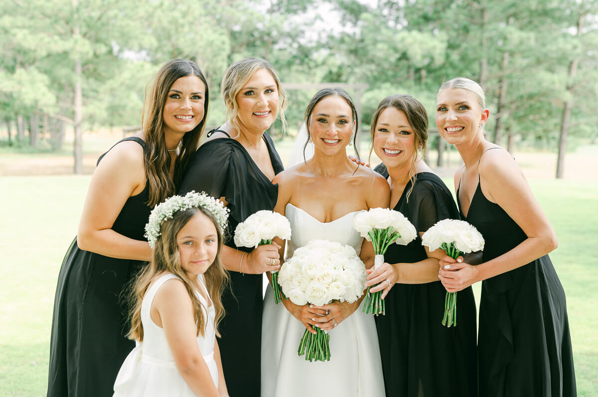 bridesmaids outside Grand Pines Reserve in Conroe, Tx