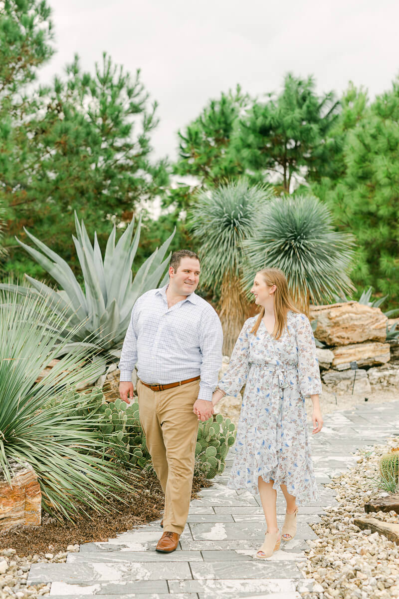 couple walking at Houston Botanic Garden 