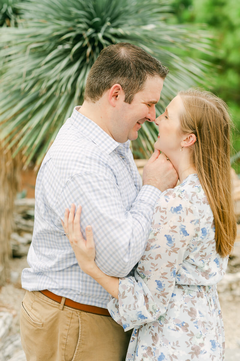engaged couple posing taken by Houston wedding photographer