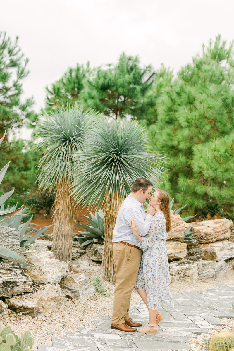 engaged couple posing taken by Houston wedding photographer