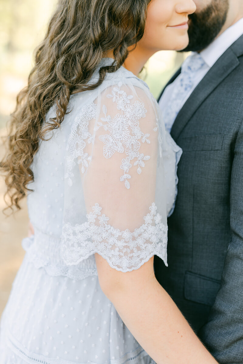 blue lace dress details from houston engagement session