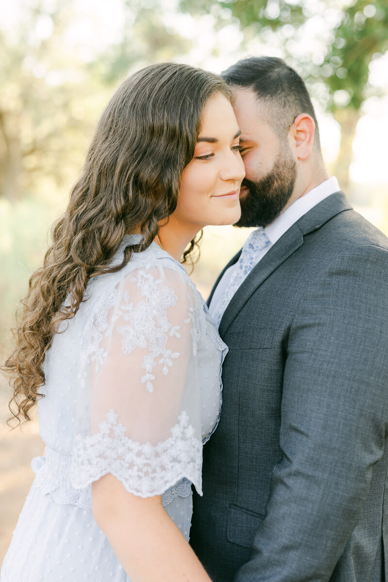 engaged couple at their engagement session at brazos bend state park