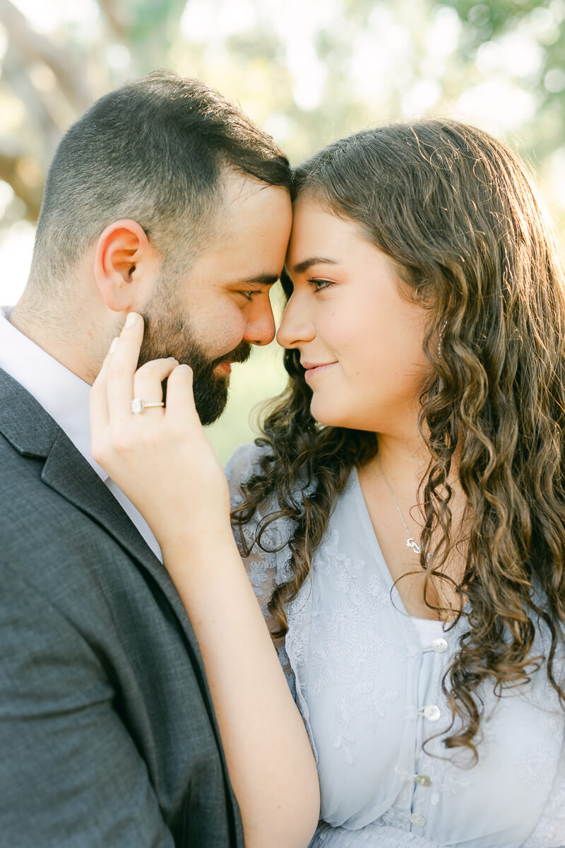 engagement couple walking at their engagement session in houston, texas