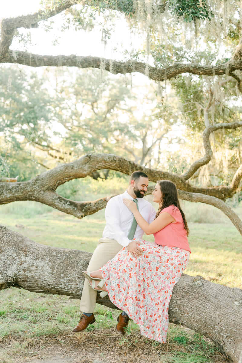 pink floral dress at engagement session in houston, texas