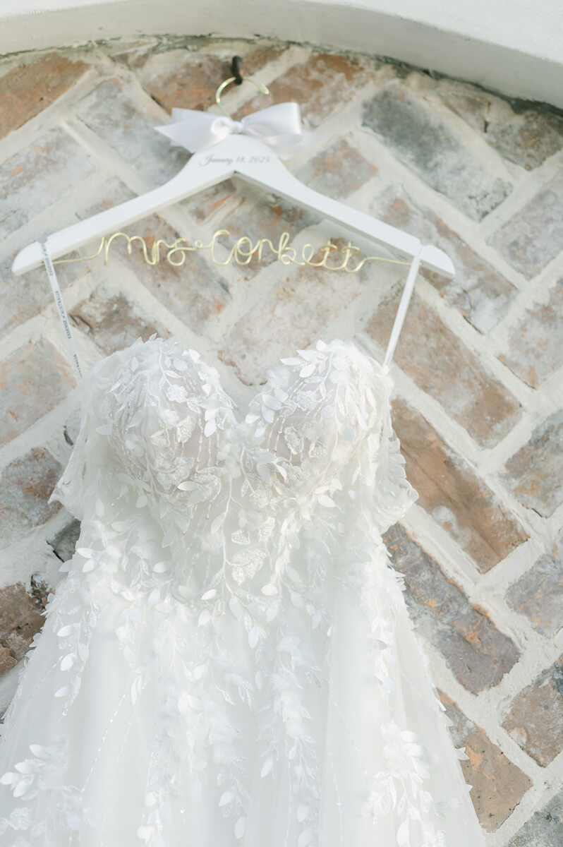 wedding dress hanging in Iron Manor bridal room 