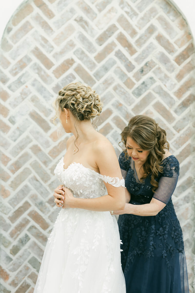 bride getting ready in the Iron Manor bridal suite