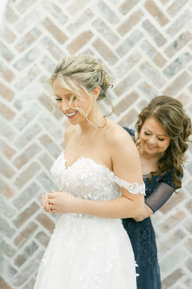 bride getting ready in the Iron Manor bridal suite