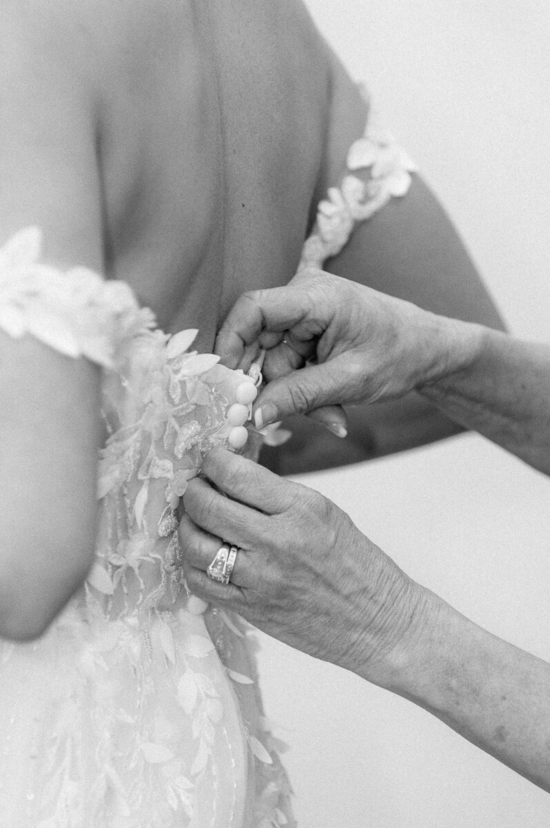 black and white photo of wedding dress buttons in Montgomery, Texas 