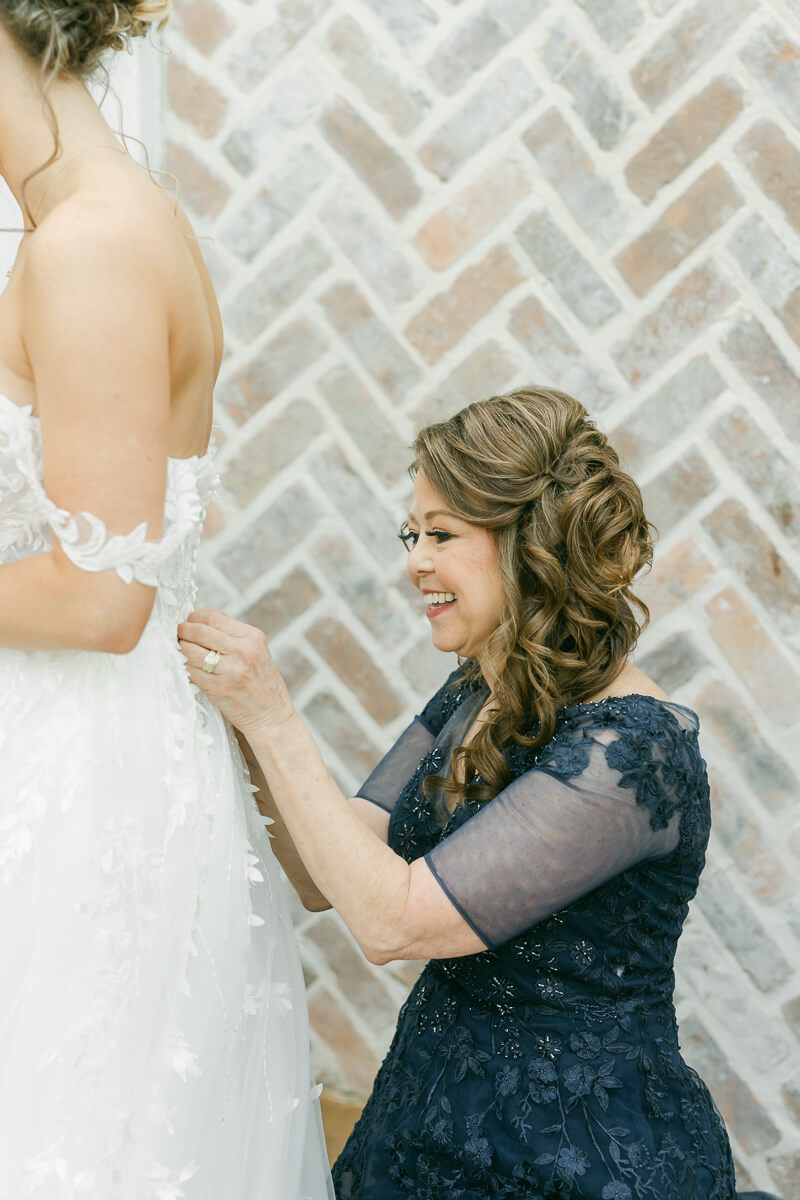 bride getting ready in the Iron Manor bridal suite