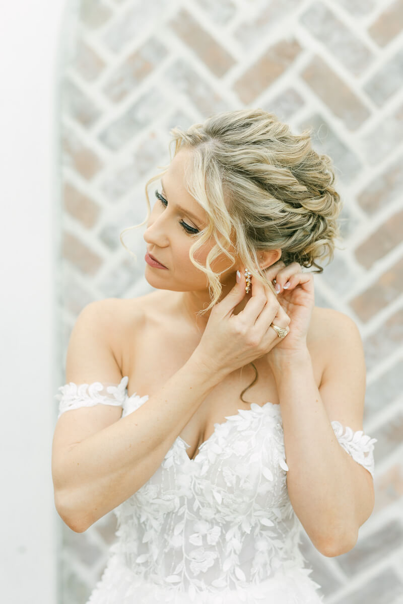 bride getting ready in the Iron Manor bridal suite