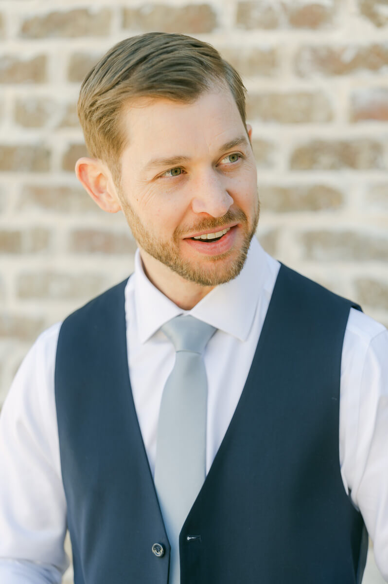 groom getting ready outside Iron Manor wedding venue