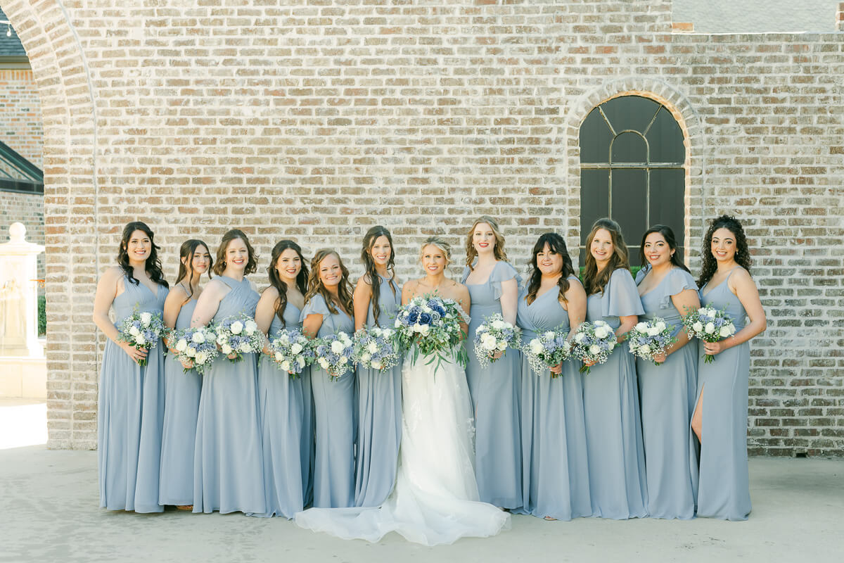 bridesmaids in light blue at an Iron Manor wedding