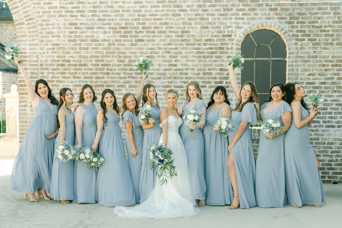 bridesmaids in light blue at an Iron Manor wedding