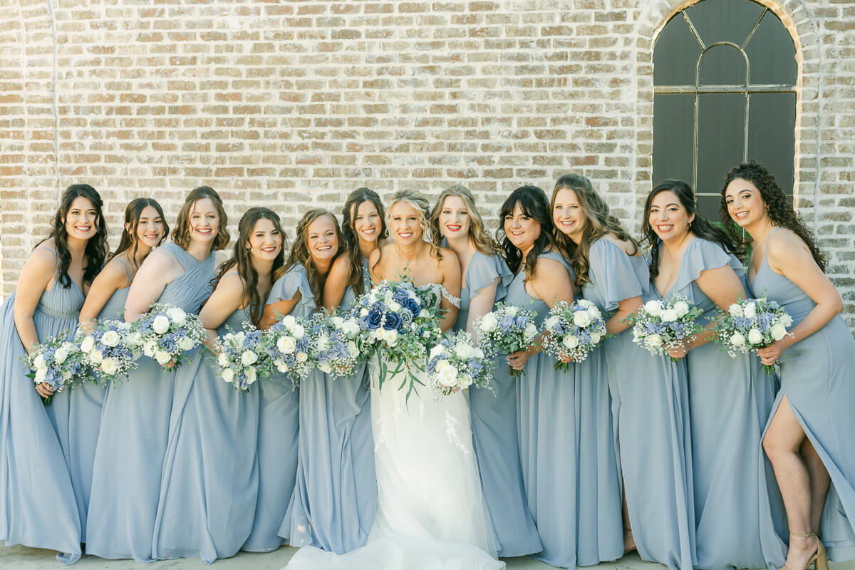bridesmaids in light blue at an Iron Manor wedding