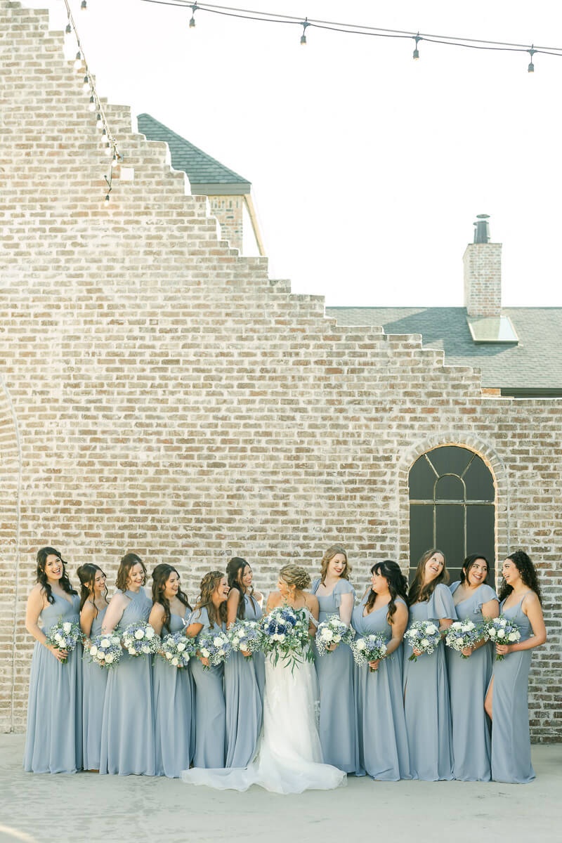 bridesmaids in light blue at an Iron Manor wedding