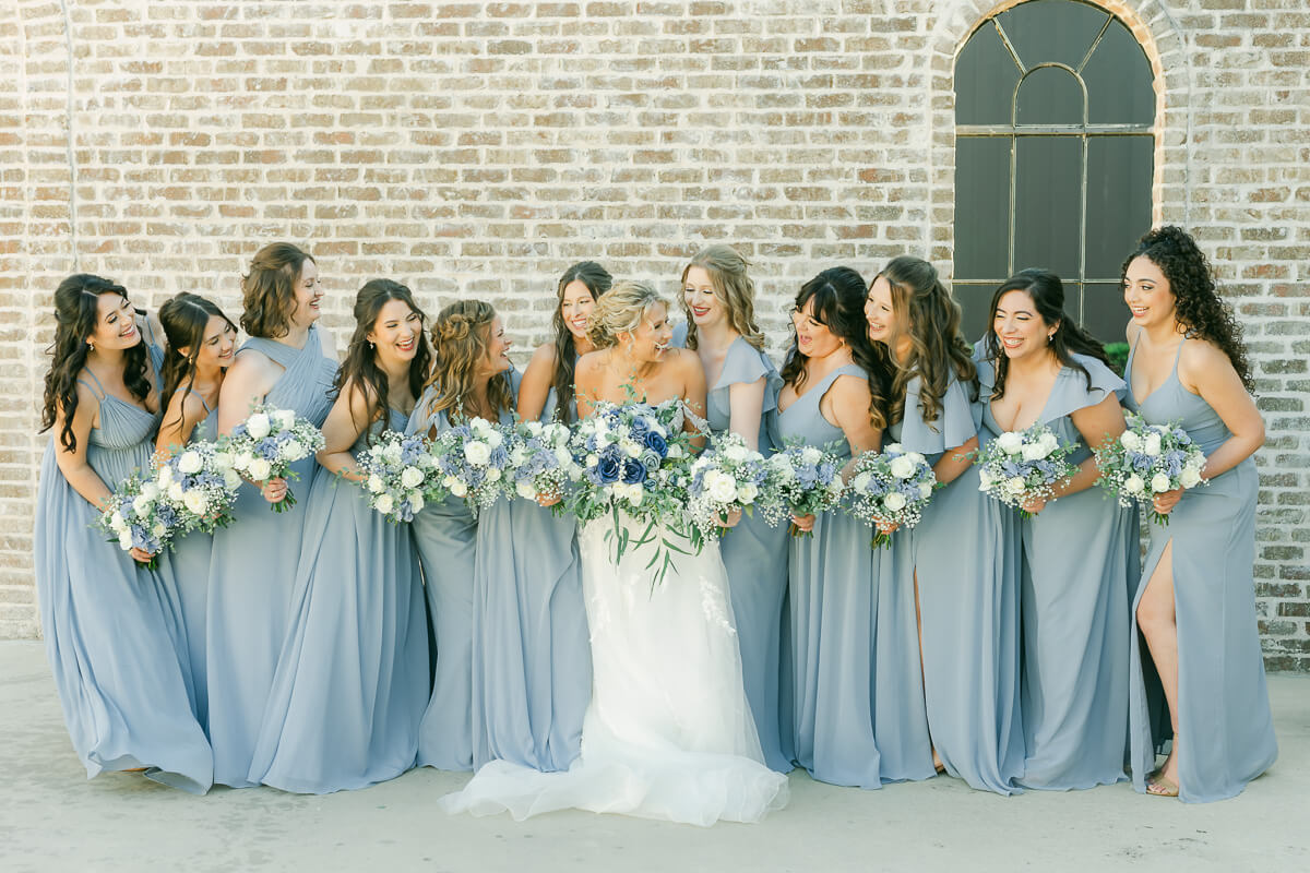 bridesmaids in light blue at an Iron Manor wedding
