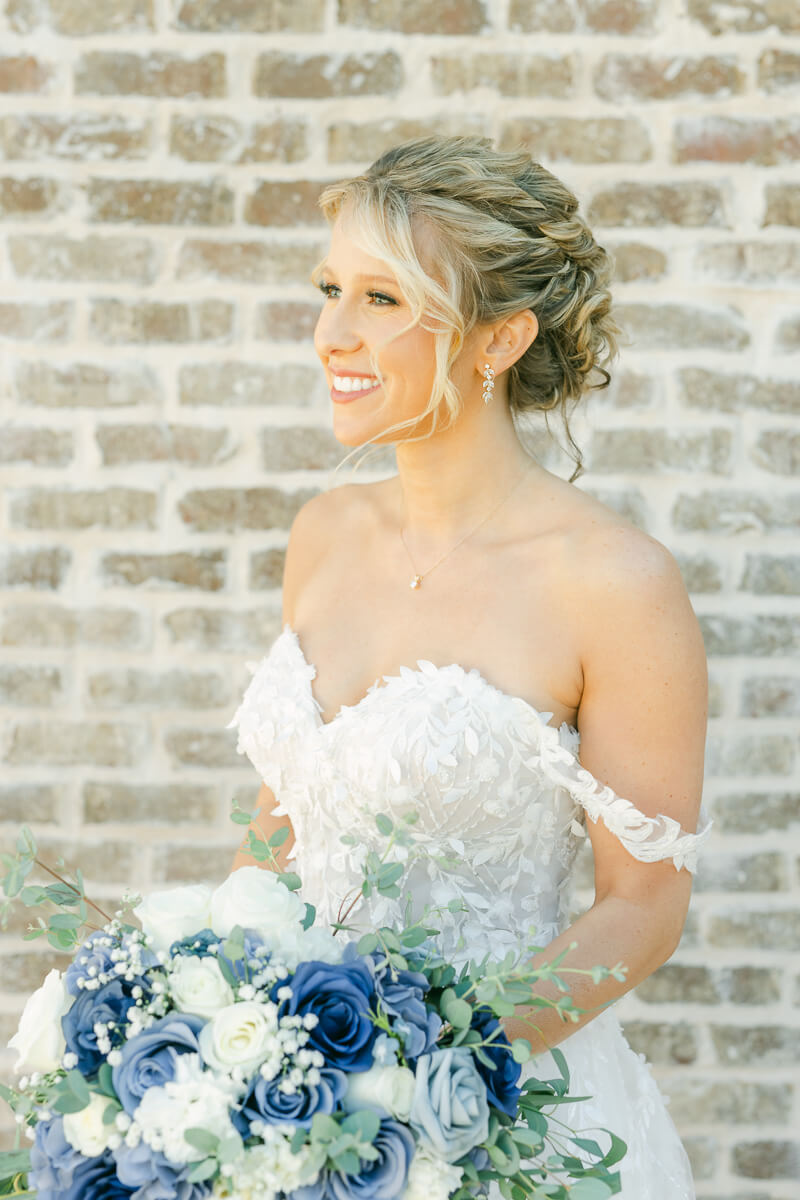 bride posing at her wedding shot by Montgomery wedding photographer
