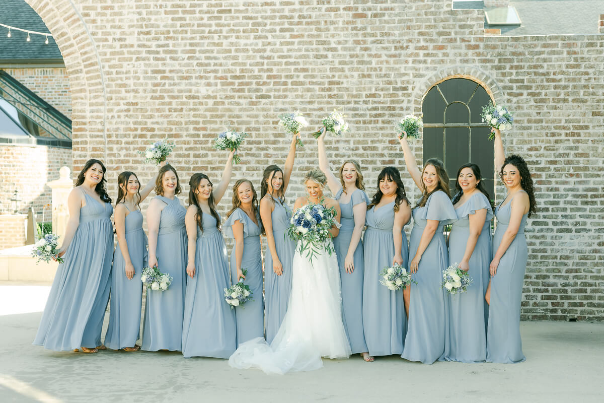 bridesmaids in light blue at an Iron Manor wedding