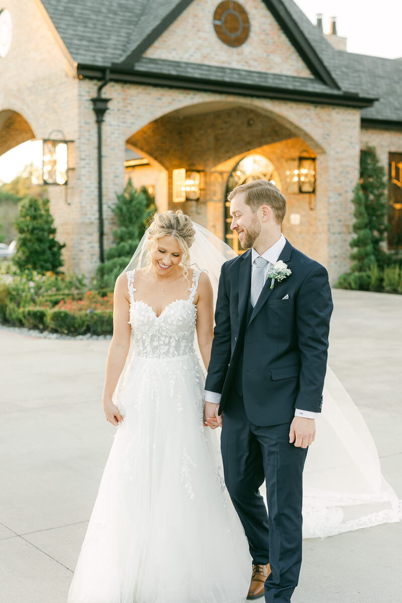 couple walking outside Iron Manor wedding venue