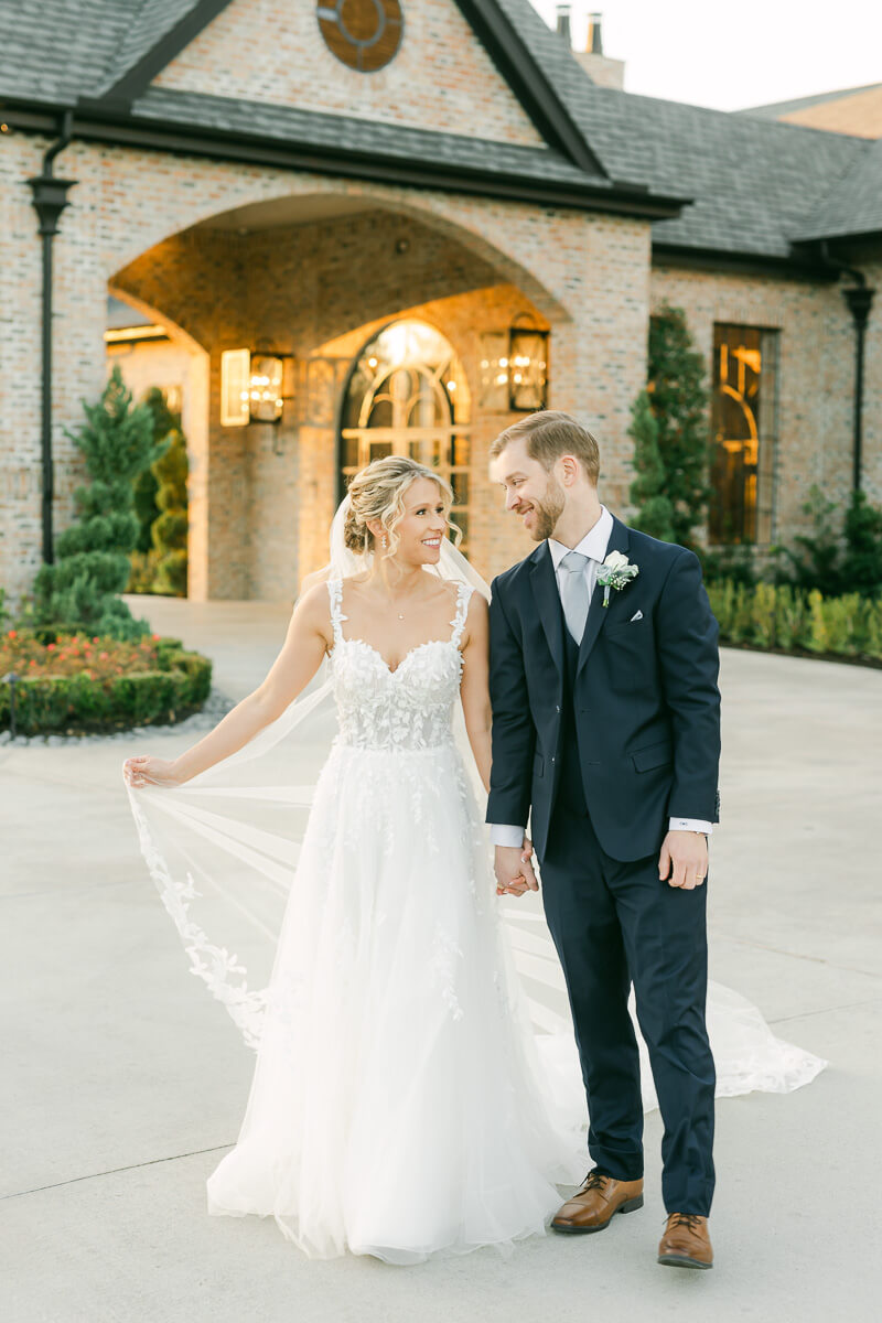 couple walking outside Iron Manor wedding venue