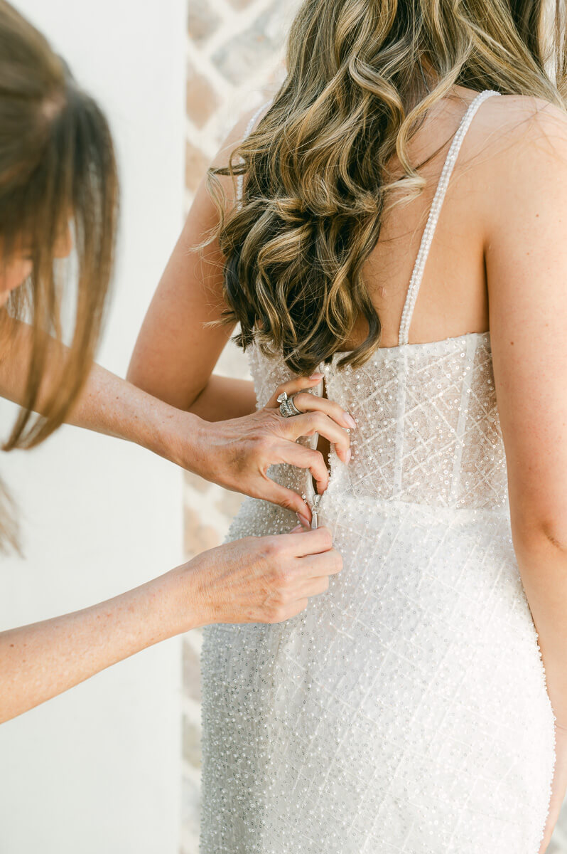 bride getting ready at the iron manor