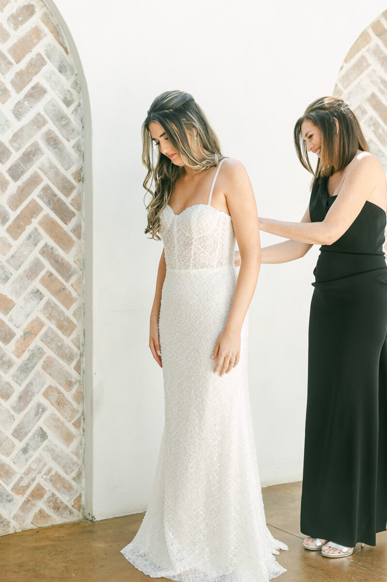 bride getting ready at the iron manor