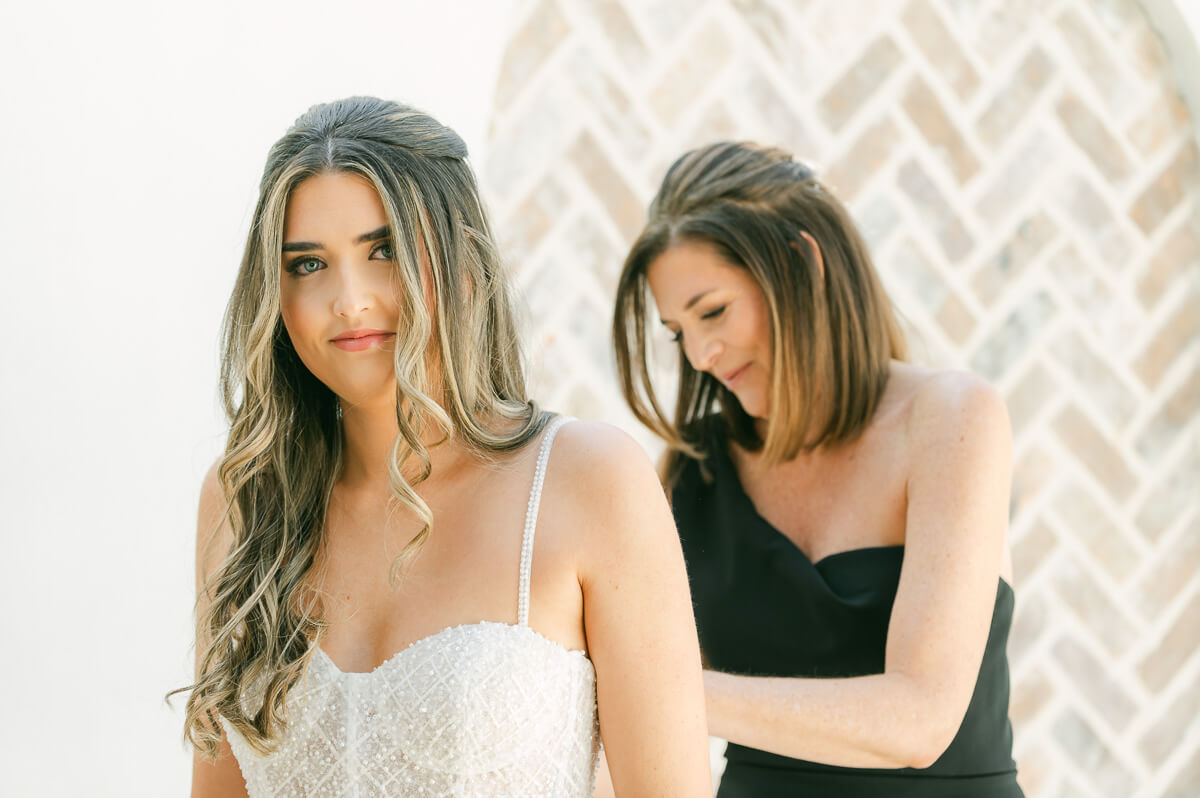 bride getting ready at the iron manor