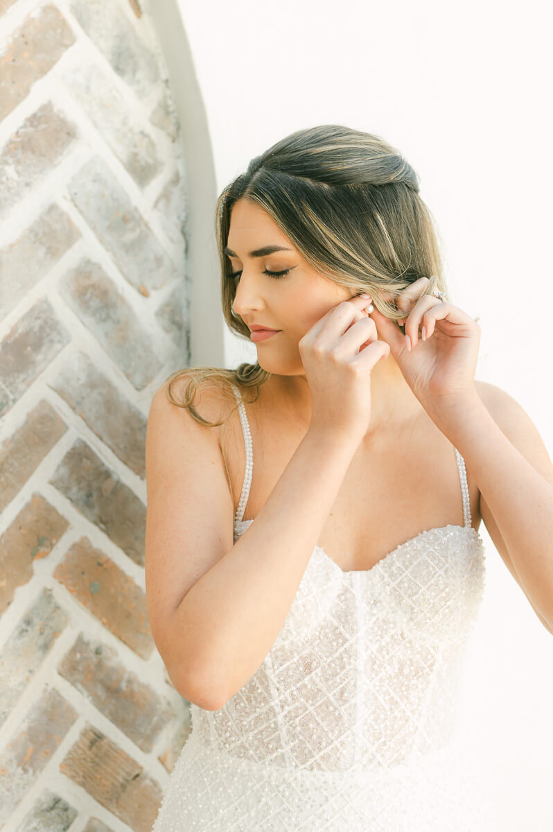 bride getting ready at the iron manor