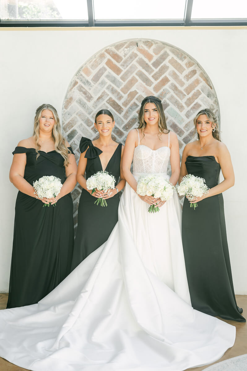 bridesmaids wearing black